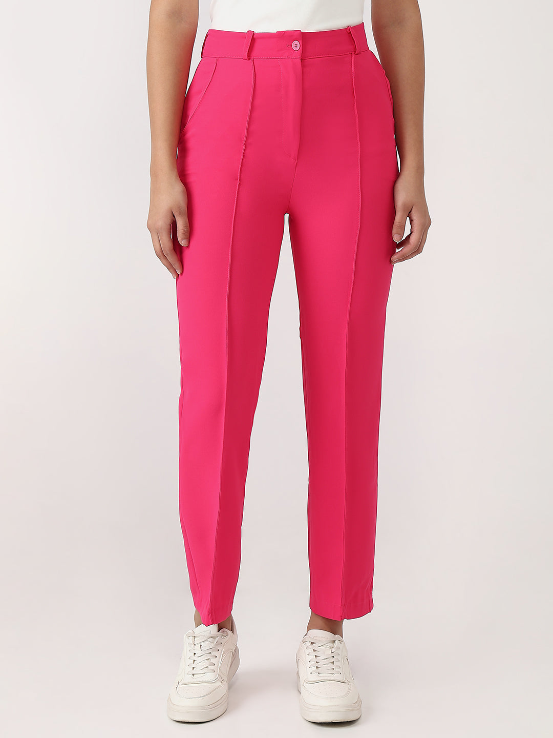Bold and vibrant hot pink polyester trousers. Tailored for a flattering high-rise fit