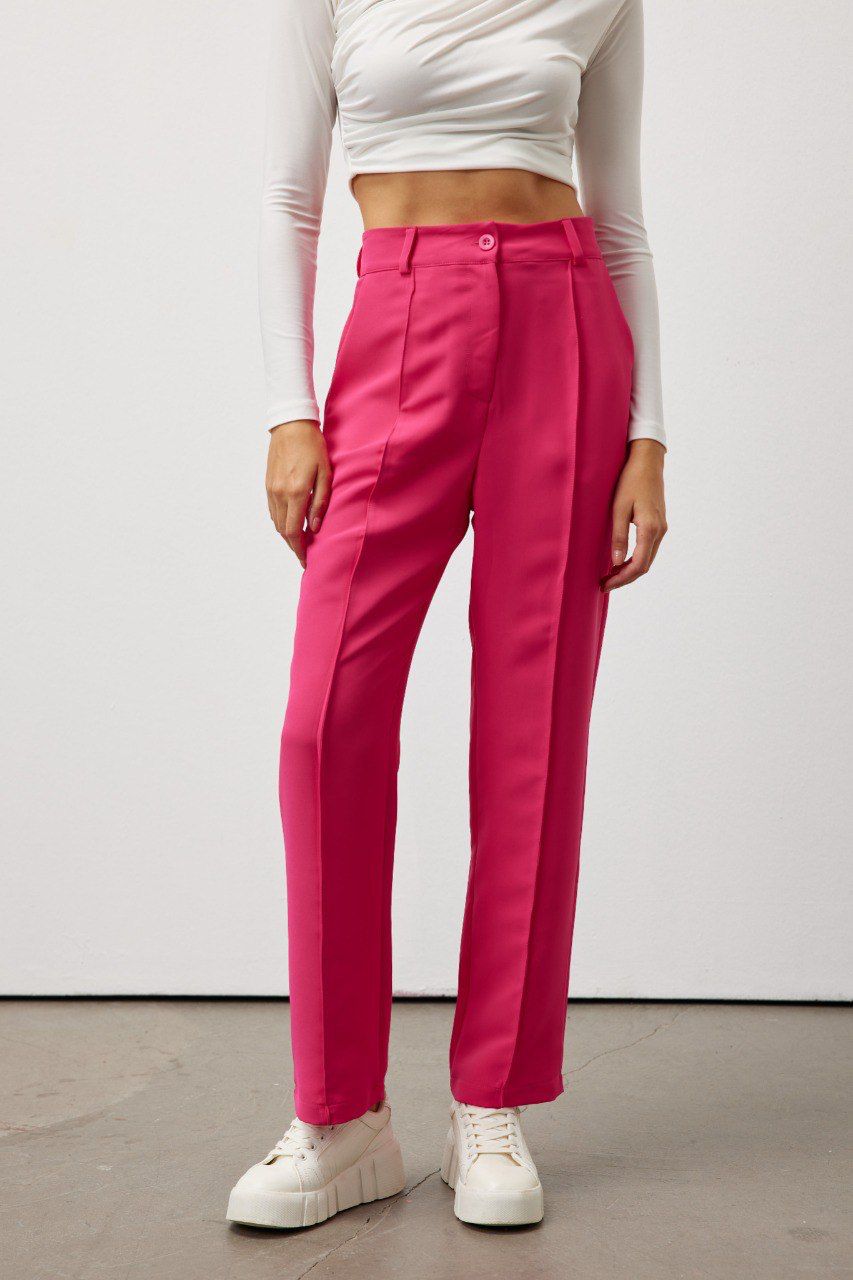 Bold and vibrant hot pink polyester trousers. Tailored for a flattering high-rise fit